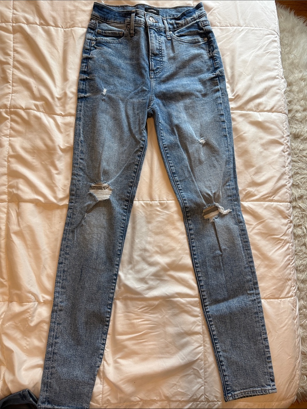 Express Distressed High-Rise Skinny Jeans in Light Wash Blue